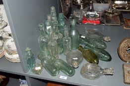A selection of twenty vintage glass bottles and baby feeding bottles including names W Bell