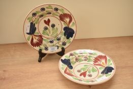 A pair of early 20th century Scottish Spongeware floral design hand-decorated bowls, retailers