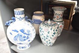 A blue and white moon flask decorated with birds, foliage and dragon style handles, h36cm, sold