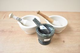 A Mason Cash Heritage mortar and pestle sold together with two similar mortar and pestles one in