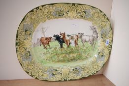 A large unusual Royal Doulton bone china meat platter/ashette, depicting cattle to centre having