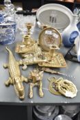 An assortment of brass items to include a vintage nutcracker in the form of a crocodile and a fox