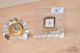 A Waterford crystal mantel clock with applied label, w7.5cm, sold together with a similar clock, (