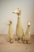 A set of three art pottery ducks, mother duck and ducklings , highest approx. 41cm