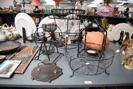 A vintage Norpro cast iron pig shaped bacon press sold together with an egg holder shaped as a