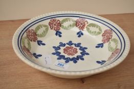 A large antique Scottish Spongeware bowl,decorated with repeating designs, diameter measures 26cm.