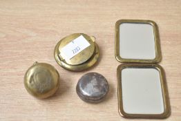 A group of small brass items including two pocket size mirrors, coin holders and snuff box