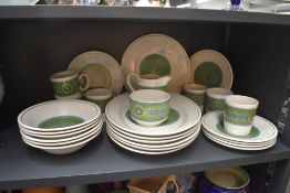 A 1970's ceramic part dinner/tea service having a distinctive green, brown and blue geometric