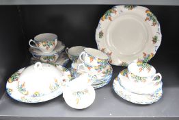 An English bone china 'Coraline' pattern part dinner/tea service comprising twenty one pieces