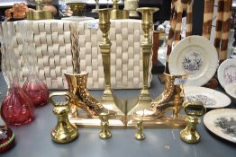 A small selection of brassware to include a pair of bookends designed as high heels, graduated