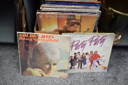 A mixed lot of approximately one hundred and fifty vinyl albums.