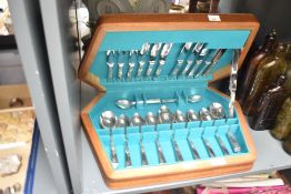 A silver-plated cutlery canteen having attractive light blue interior.