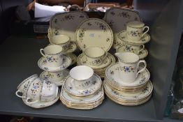 A Shelley 'Chelsea' pattern tea service, having gilt edging and decorated with floral designs on a