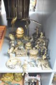 A selection of brassware including miniature candlesticks and frogs etc.