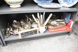 A large assortment of silver-plated cutlery and flatware etc.