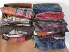 A large quantity of tartan fabrics to include 100% pure wool and cotton, in a wide range of