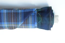 Two lengths of tartan, to include a bolt of traditional tartan in nav blue, forest green and black