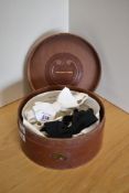 A vintage leather collar box and five collars, the hat box being brown smooth leather, having an