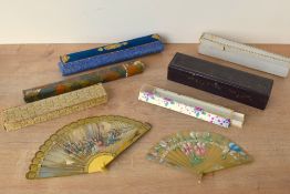 A 19th century fan of bone or similar depicting a regency leisure scene, and another with hand