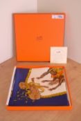 A vintage Hermes scarf featuring Les Fete Du Roi Soleil design by Michel Duchene, first release