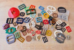 A collection of antique and vintage belt buckles.