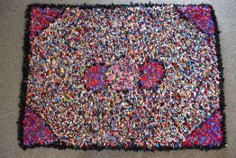 Two vintage rag rugs, measuring 38 x 55 inches, 48 x 70 inches, red, black and blue colour