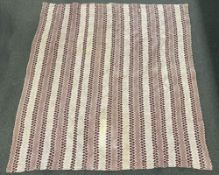 A French antique Boutis quilt, in a rose, burgundy and cream textured-diamond-stripe design, with