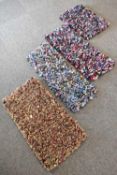 Four rag rugs sized ideally as welcome mats or small area rugs, 14 x 22 inches, 16 x 34 inches,