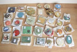 A collection of thirty-two vintage compacts, cigarette cases and vanity boxes, to include Zenette,