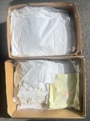 A quantity of white cotton and other soft furnishings, furniture protectors, tablecloths, to include