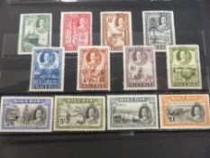 NIGERIA GV 1936 DEFINITIVES MINT SET OF 12 Card with for the most part lightly mounted mint set of