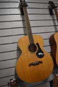 An Alvarez ABT60 Baritone acoustic guitar, professionally converted to electric with Fishman pick up