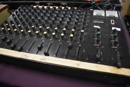 A vintage MM 12 channel mixing desk (af)