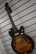 A Harmony Rocket archtop electric guitar , in sunburst, stamped H54, as found with repairs etc