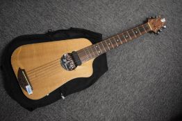 A Richard Cross of Shapelywood skinny travel guitar, label id 4020