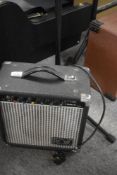 A Ross practice amp and mic stand