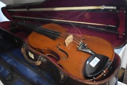 A traditional violin having two piece back, and inlaid decoration to tail piece, labelled to