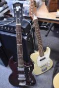 Two electric guitar, having Gibson SG and Fender Telecaster style bodies , labelled Zenta to