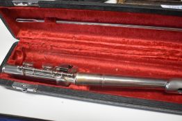 A Chinese flute, stamped H Singhai , with fitted case