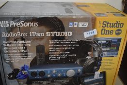A Presonus AudioBox iTwo studio interface, hardly used , includes M7 condenser microphone but no