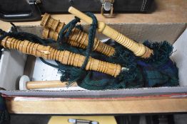 A set of Junior Player bagpipes , boxed