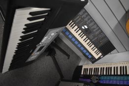 Three Yamaha keyboards, including Portasound PSS-680