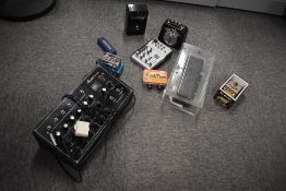 A box of various guitar and amplifier related items including Eurorack UB502 mixer, Marshall mini