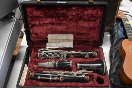A vintage Boosey & Hawkes clarinet, London Series 2-20, serial number 203596, in fitted case
