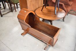 A 19th Century mahogany rocking crib, length approx. 97cm