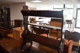 A set of Victorian stained frame Gothic style bookshelves with trough base, width approx. 70cm