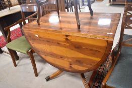 An early 20th century drop leaf table, L91cm, sold together with 5 chairs