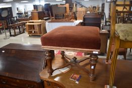 A 19th Century walnut frame dressing table stool having later dralon upholstered seat and X