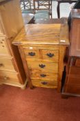 A modern mango or similar narrow chest of two over three drawers, dimensions approx. H80 W49 D40cm