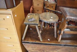 Two antique milking or similar stools